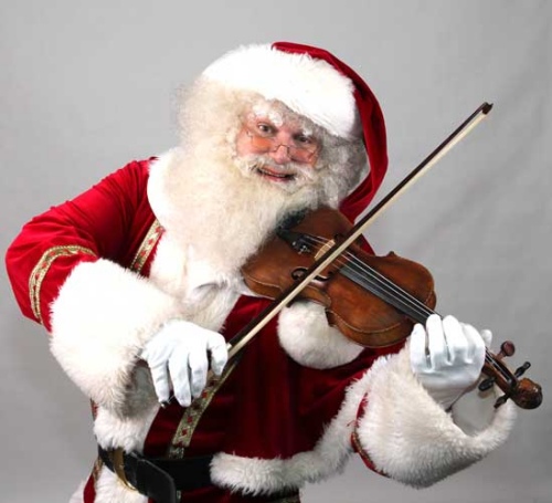 Muzikale Kerstman te boeken bij www.kerst-entertainment.nl