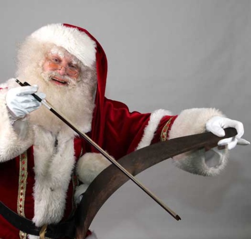 Muzikale Kerstman te boeken bij www.kerst-entertainment.nl